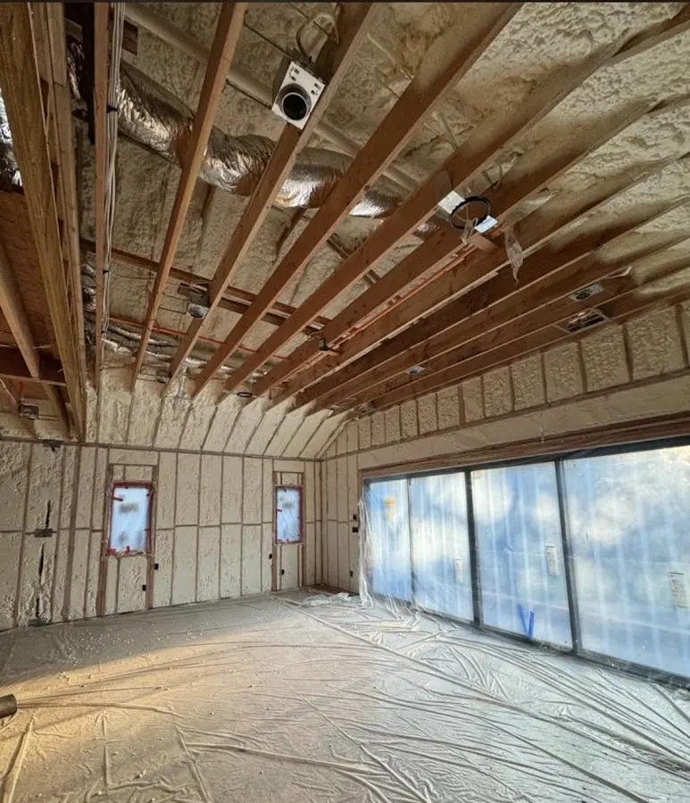 Interior walls and ceiling insulated with spray foam during new construction in Sunrise